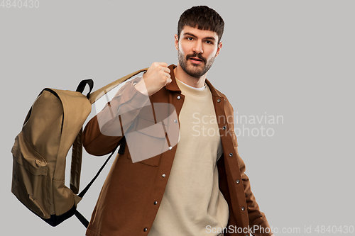 Image of young man with backpack