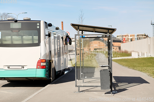 Image of empty bus stop on street of Tallinn city