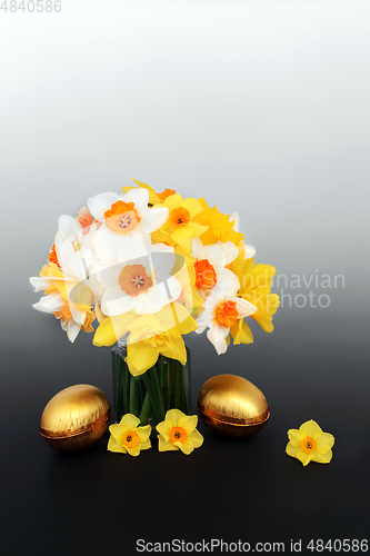 Image of Gold Easter Eggs with Daffodil and Narcissus Flowers
