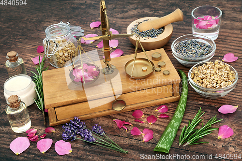 Image of Weighing Herbs and Flowers for Natural Skincare Treatments