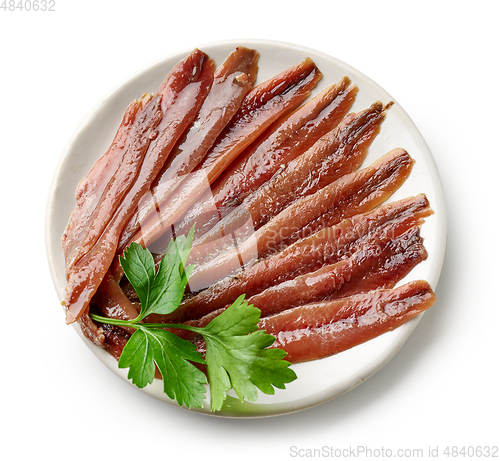 Image of plate of canned anchovies