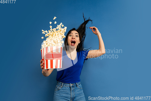 Image of Caucasian woman\'s portrait isolated on blue studio background