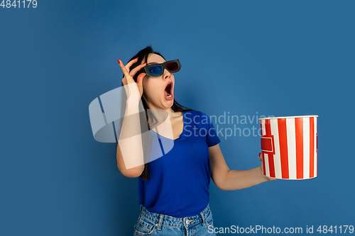 Image of Caucasian woman\'s portrait isolated on blue studio background