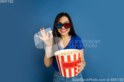 Image of Caucasian woman\'s portrait isolated on blue studio background