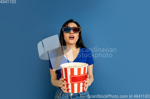 Image of Caucasian woman\'s portrait isolated on blue studio background