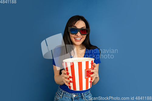 Image of Caucasian woman\'s portrait isolated on blue studio background