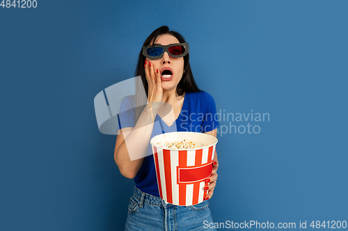 Image of Caucasian woman\'s portrait isolated on blue studio background