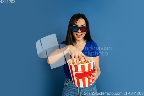 Image of Caucasian woman\'s portrait isolated on blue studio background