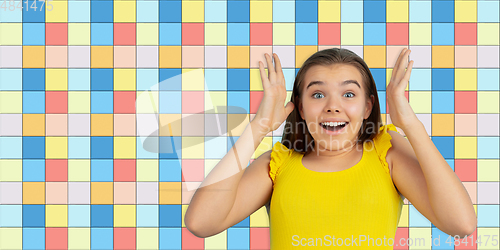 Image of Caucasian woman\'s portrait on mosaic tiles on the background, flyer