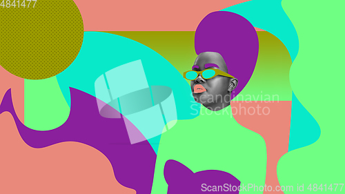 Image of Portrait of a beautiful young woman with bright colorful painted design, flyer