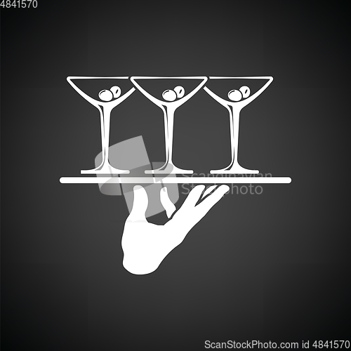 Image of Waiter hand holding tray with martini glasses icon