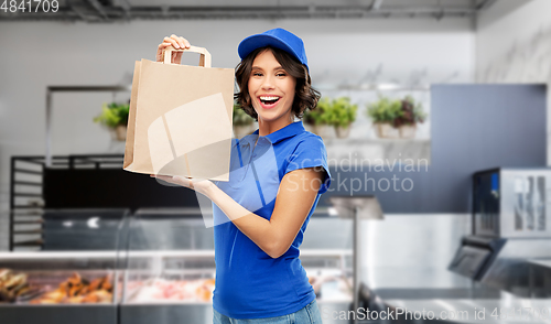 Image of delivery woman with takeaway food in paper bag