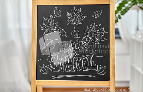 Image of back to school lettering drawn on chalkboard