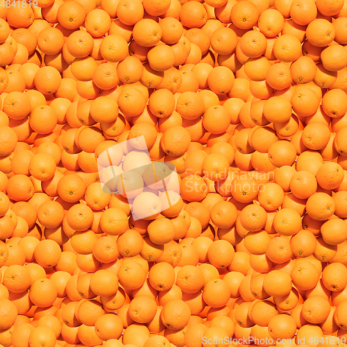 Image of Pattern made from bunch of oranges. Top view, flat design. Healthy food.