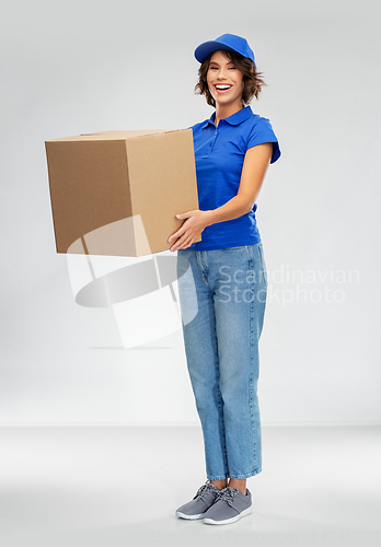 Image of happy smiling delivery woman with parcel box