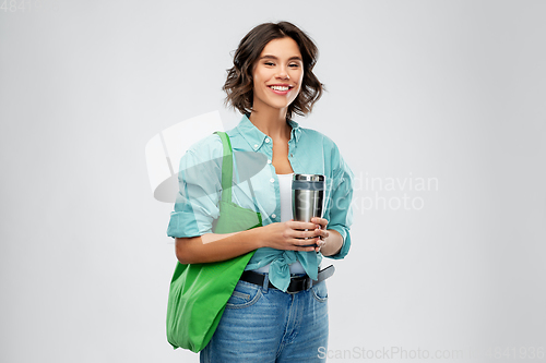Image of woman with bag for food shopping and tumbler