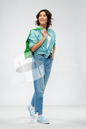 Image of woman with reusable canvas bag for food shopping