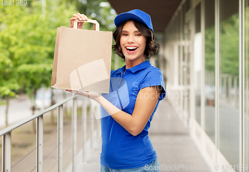 Image of delivery woman with takeaway food in paper bag