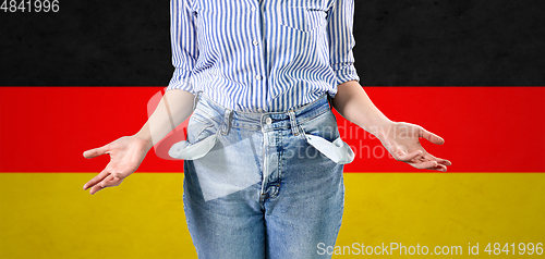 Image of close up of woman showing empty pockets