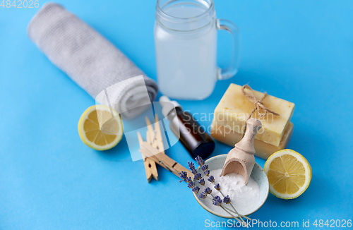 Image of washing soda, soap, towel, dropper and clothespins