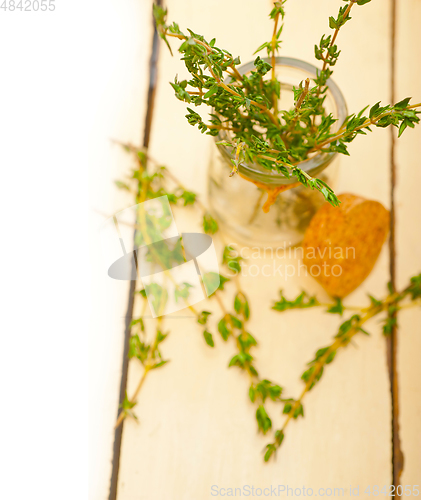 Image of fresh thyme on a glass jar