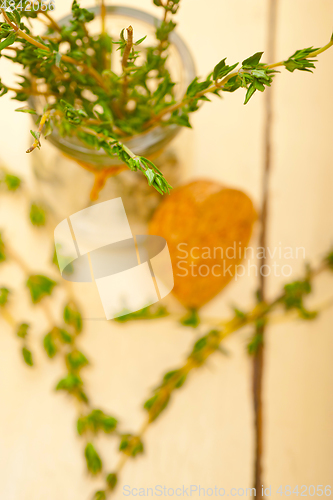 Image of fresh thyme on a glass jar