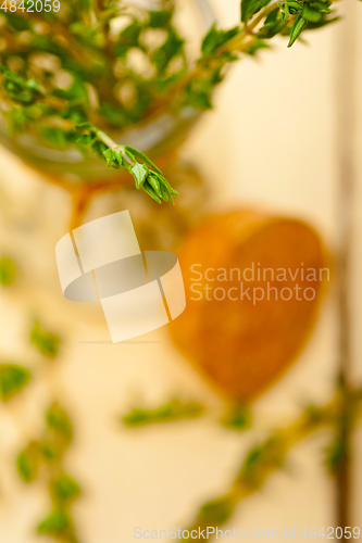 Image of fresh thyme on a glass jar