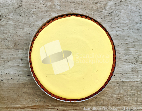 Image of lemon tart on wooden table
