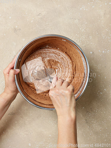 Image of process of making dough for chocolate cake