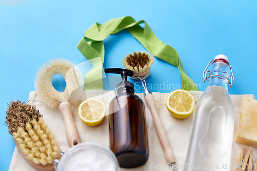 Image of natural cleaning supplies and canvas tote bag
