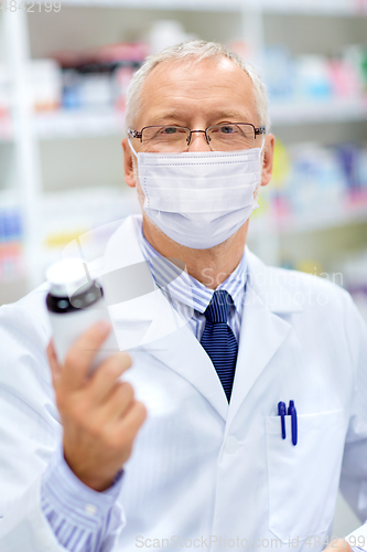 Image of old apothecary in mask with medicine at pharmacy