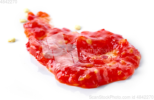 Image of red hot chili pepper sauce