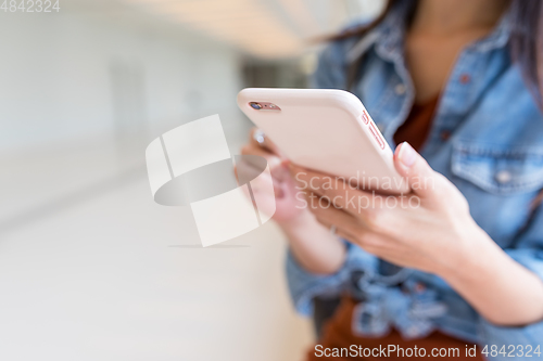 Image of Woman use of mobile phone