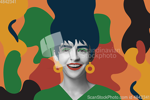 Image of Portrait of a beautiful young woman with bright colorful painted design