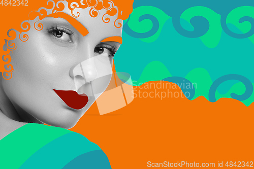 Image of Portrait of a beautiful young woman with bright colorful painted design