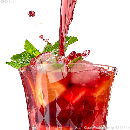 Image of glass of splashing sangria