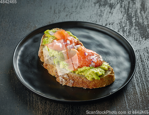 Image of sandwich with avocado and salmon