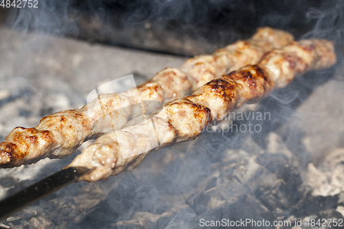 Image of Cooking meat on the grill