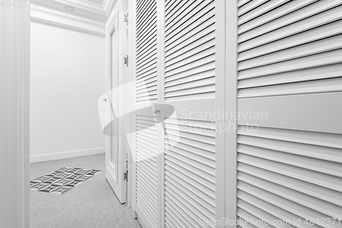 Image of White wardobe room in new apartment