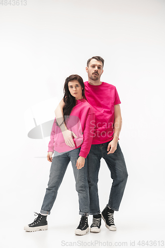 Image of Trendy fashionable couple isolated on white studio background