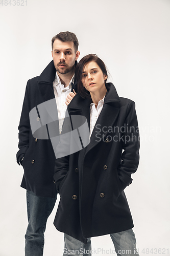 Image of Trendy fashionable couple isolated on white studio background