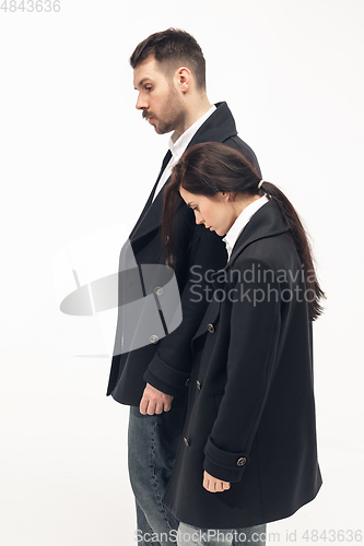 Image of Trendy fashionable couple isolated on white studio background