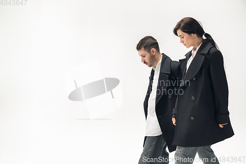 Image of Trendy fashionable couple isolated on white studio background