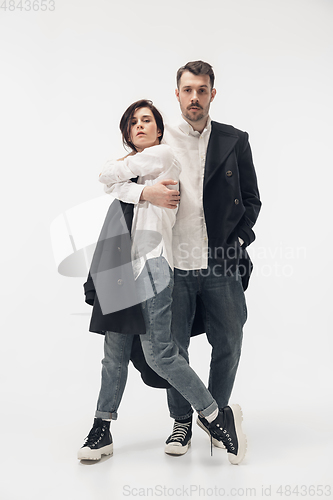 Image of Trendy fashionable couple isolated on white studio background