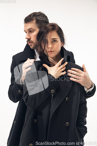 Image of Trendy fashionable couple isolated on white studio background