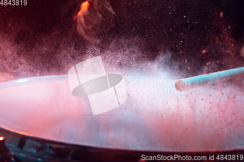 Image of Drummer\'s rehearsing on drums before rock concert. Man recording music on drumset in studio