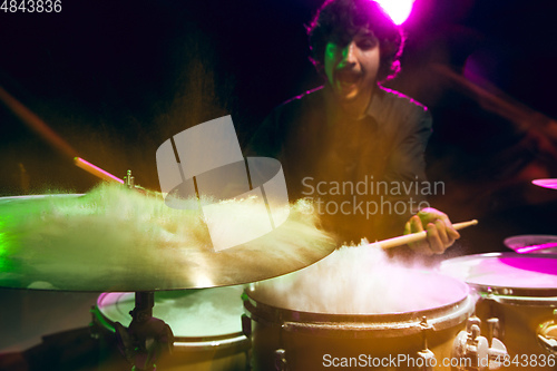 Image of Drummer\'s rehearsing on drums before rock concert. Man recording music on drumset in studio