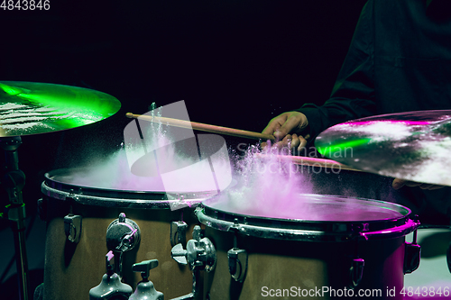 Image of Drummer\'s rehearsing on drums before rock concert. Man recording music on drumset in studio