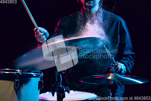 Image of Drummer\'s rehearsing on drums before rock concert. Man recording music on drumset in studio