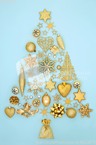 Image of Christmas Tree Concept Shape with Gold Objects